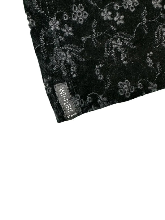 Pantaloni vintage con fiorellini traforati