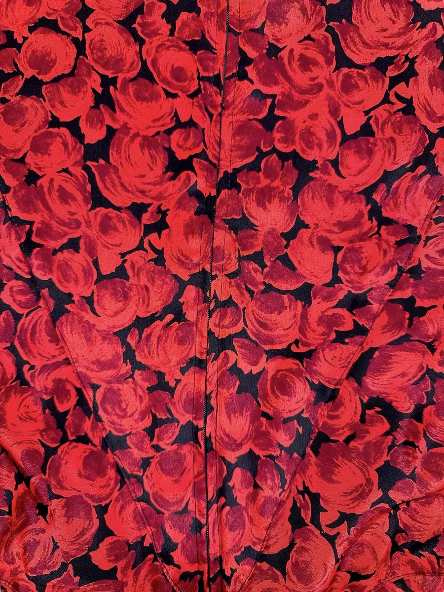 Vestito con fantasia di rose