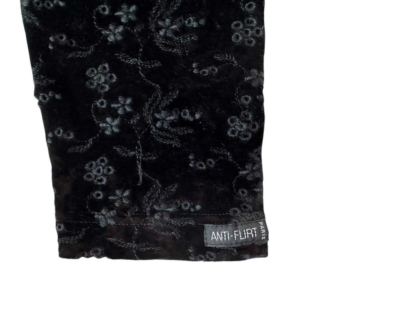Pantaloni con fiorellini traforati