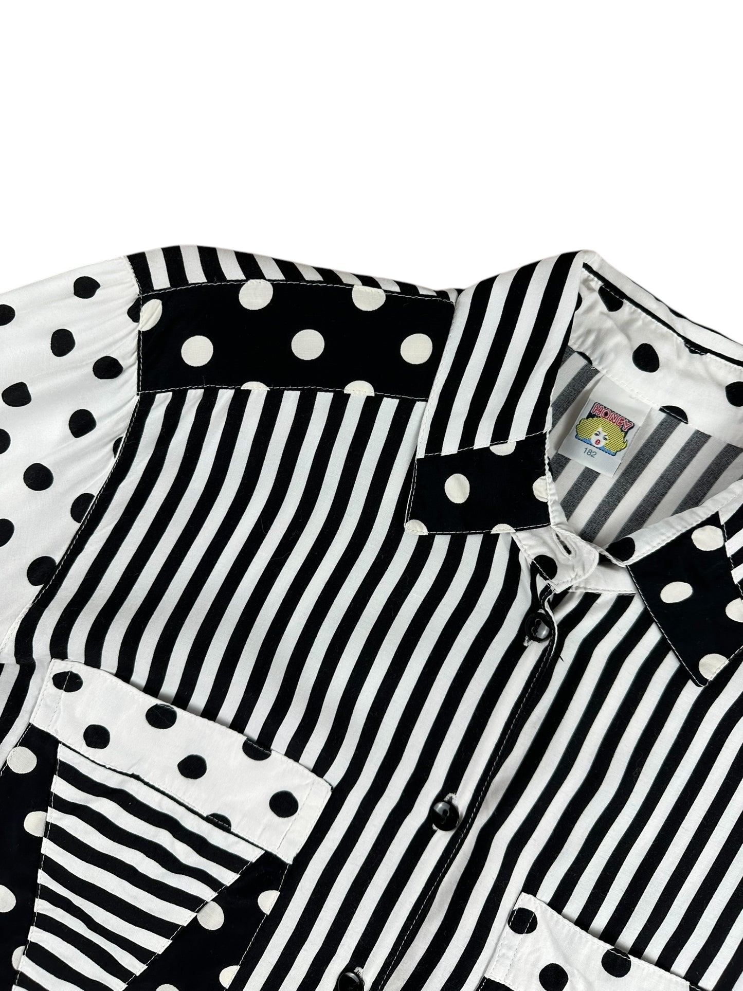 Camisa de mujer de rayas y lunares en blanco y negro