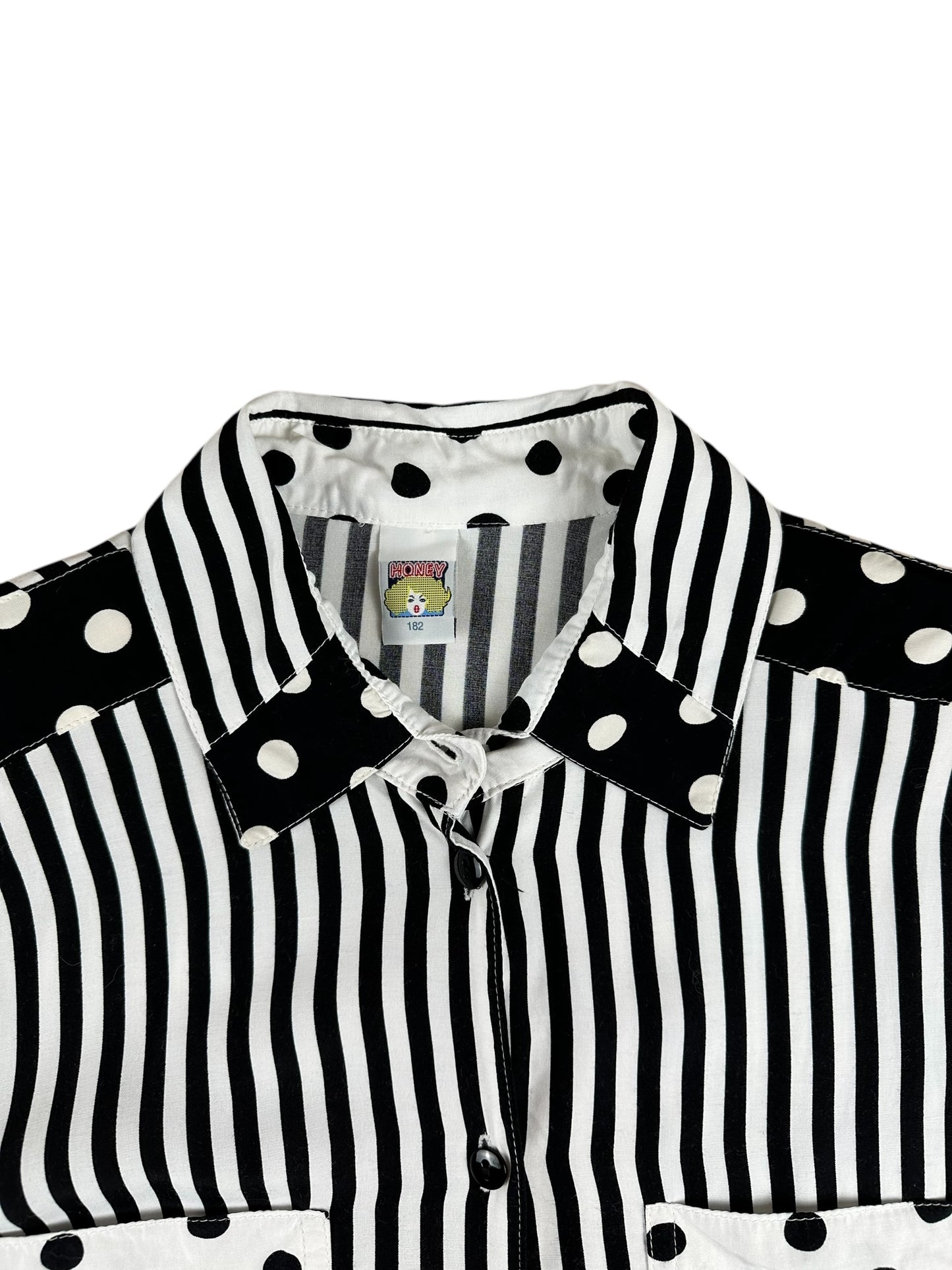 Camisa de mujer de rayas y lunares en blanco y negro