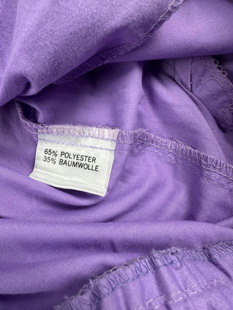 Giacchetto tuta vintage anni ’80 lilla con inserti verde acqua e neri