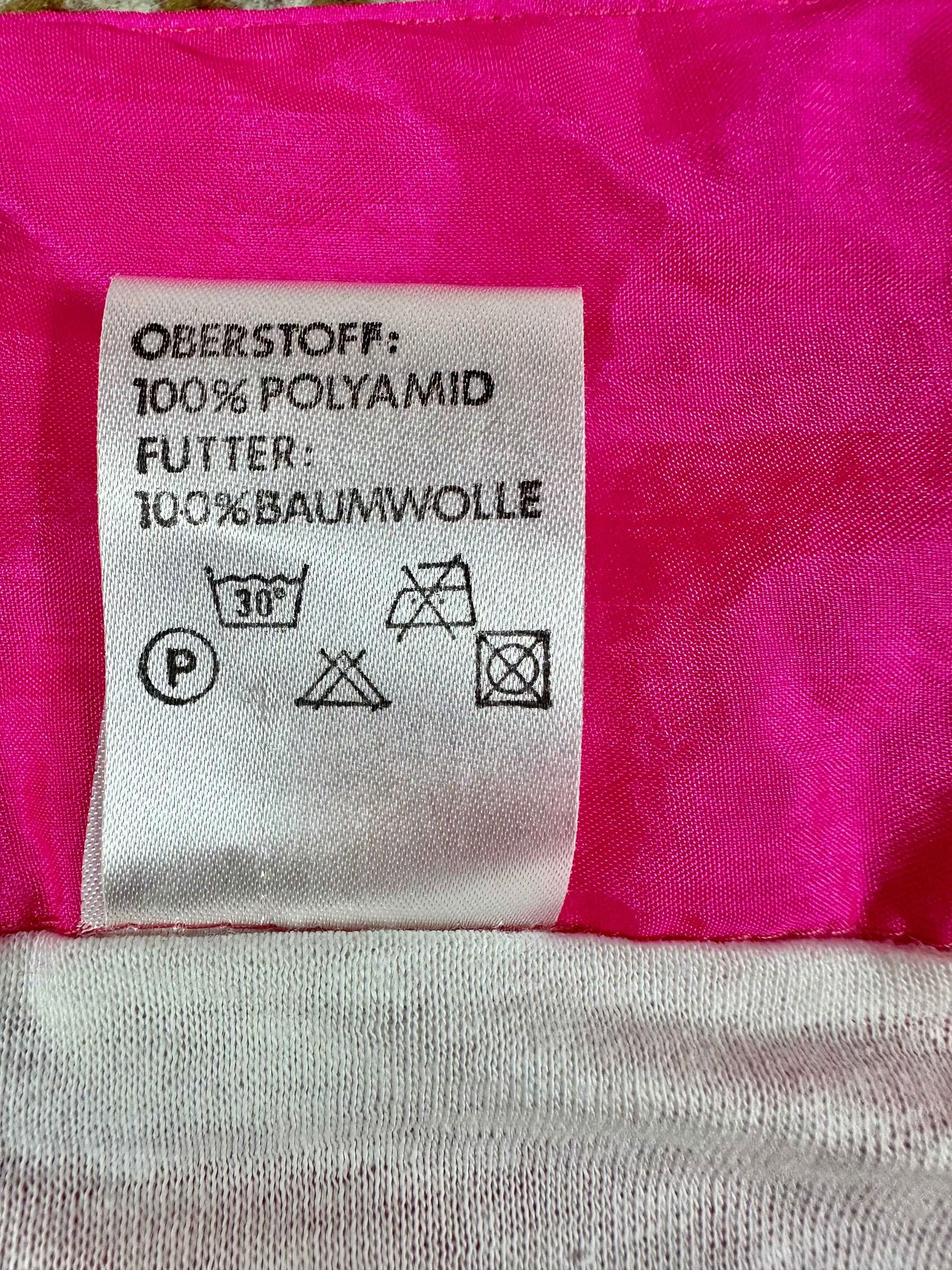 Tuta anni ’90 rosa fluo con zip