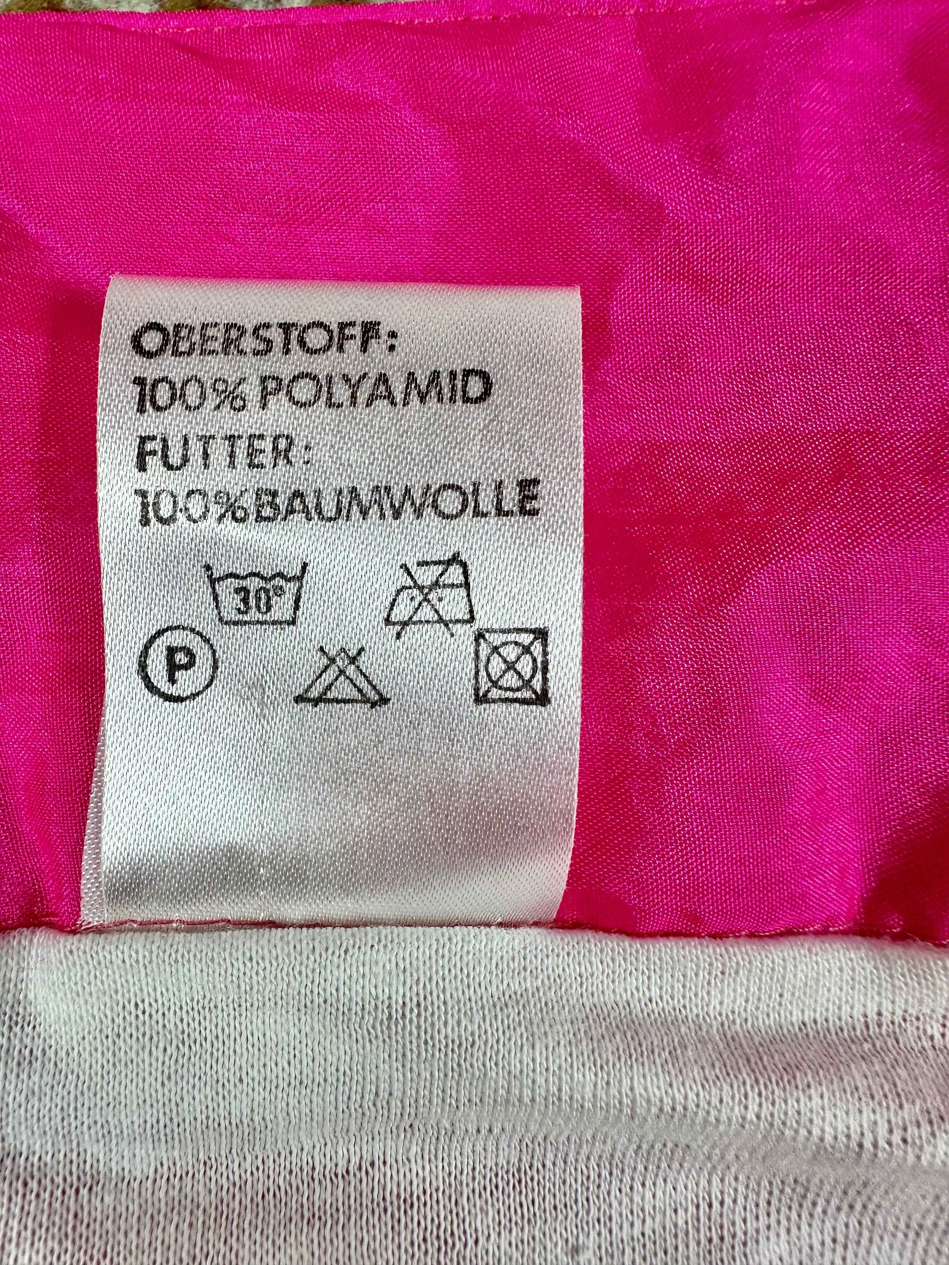 Tuta anni ’90 rosa fluo con zip