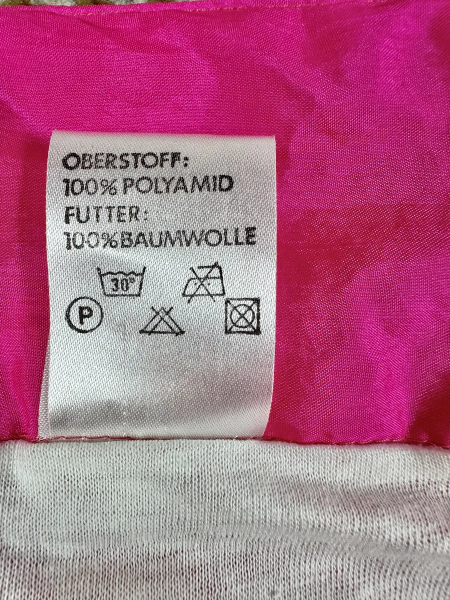 Tuta vintage anni ’80 rosa fluo con zip