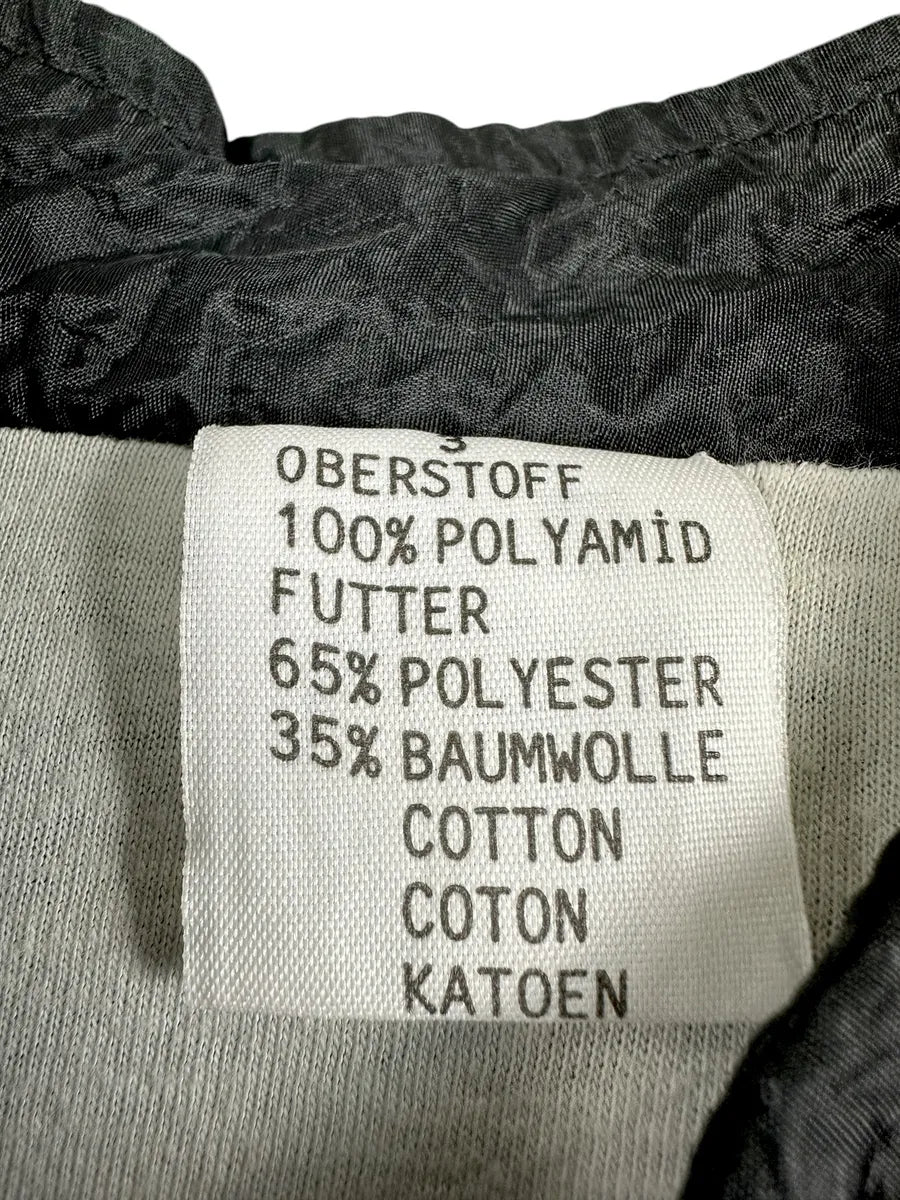 Veste de survêtement vintage années 90 noire avec empiècements violets et bleu ciel