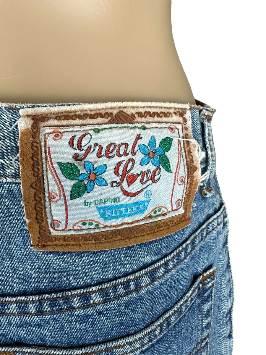 Jeans vintage da donna con piccoli ricami