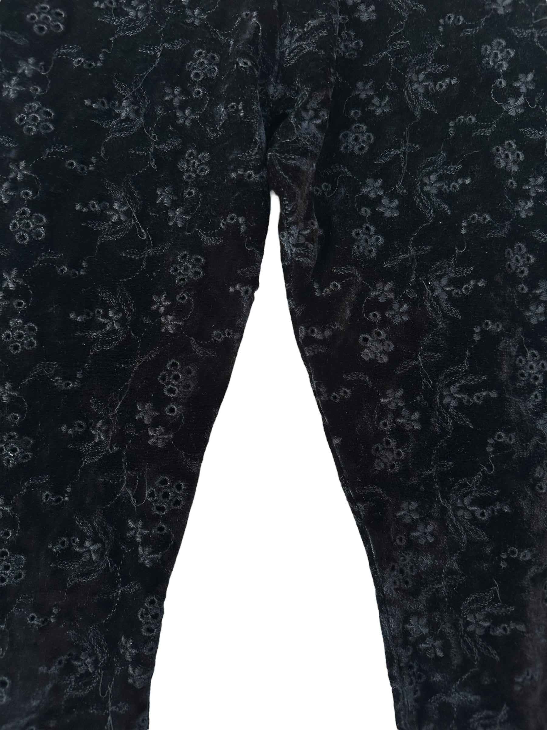 Pantaloni con fiorellini traforati