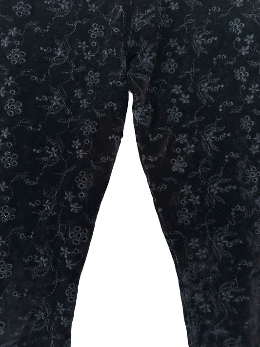 Pantaloni con fiorellini traforati