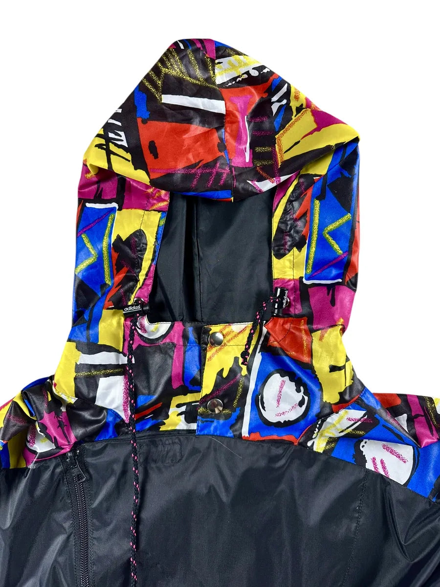 Giacca a vento vintage Adidas anni '90 nera con striscia a fantasia