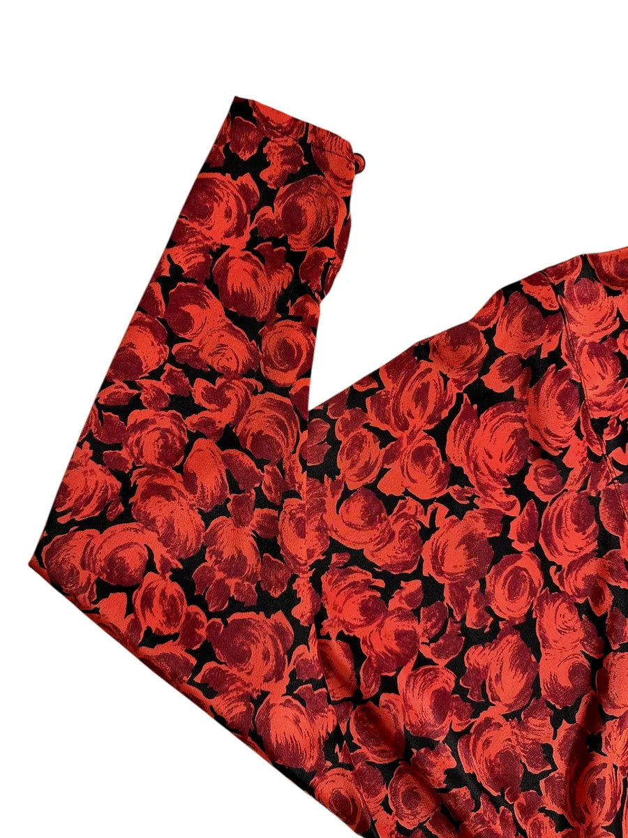 Vestito con fantasia di rose